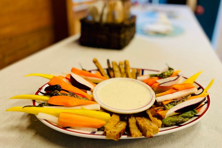 a plate of peppers and carrots