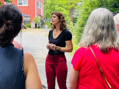 a food & farm tour guide speaking to guests