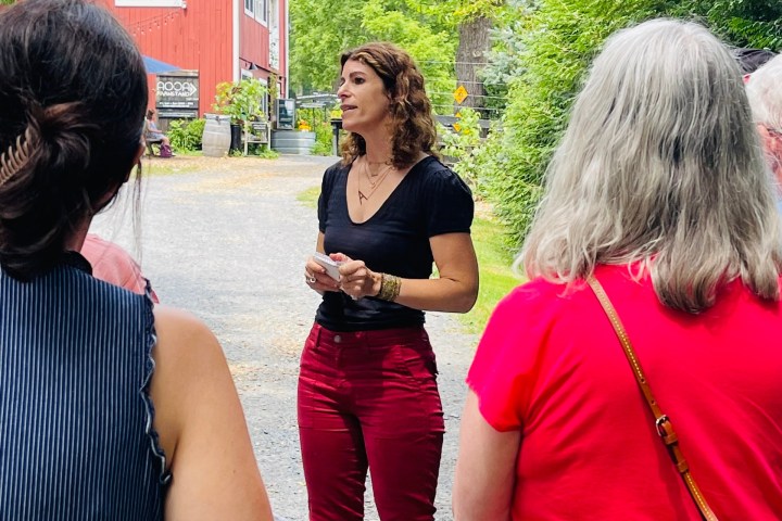 a food & farm tour guide speaking to guests