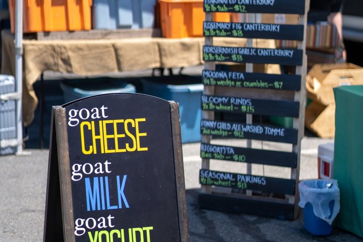 a sign promoting goat cheese, milk, and yogurt