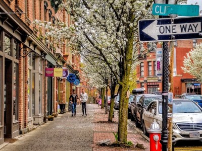 a sign on the side of the street