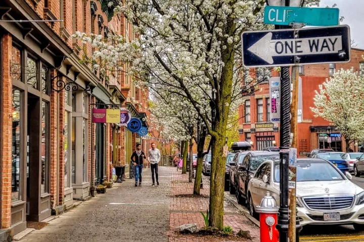 a sign on the side of the street