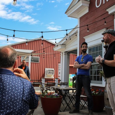 a man standing in front of a building