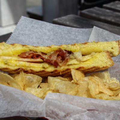 a close up of a sandwich sitting on top of a table