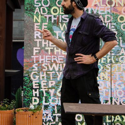 a person standing in front of a building