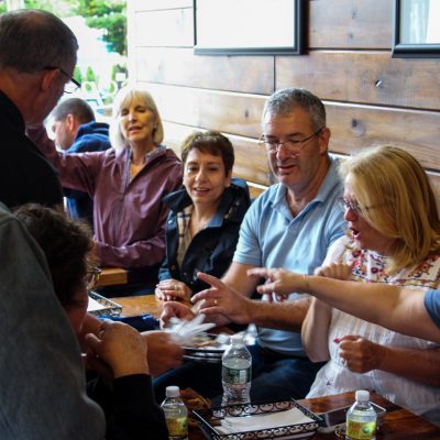 a group of people sitting at a table