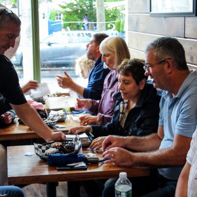 a group of people sitting at a table