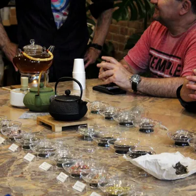 a man sitting at a table in a restaurant