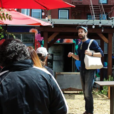 a group of people standing in front of a building