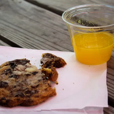 a piece of cake sitting on top of a wooden table