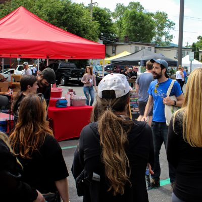 a group of people standing in front of a crowd