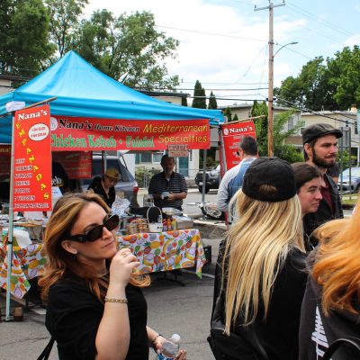 a group of people that are standing in the street