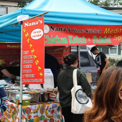 a person standing in front of a store