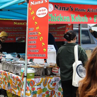 a person standing in front of a store