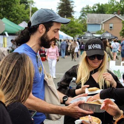 a group of people around each other